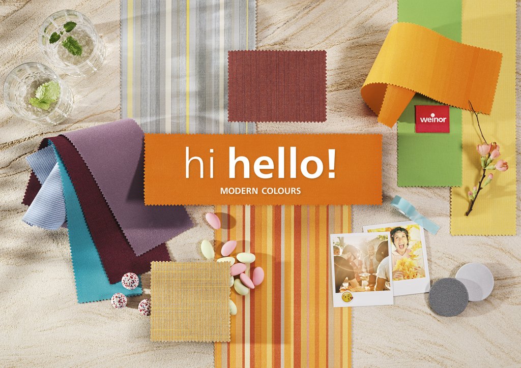 Bunte Stoffe und Dekorationen auf einem hellen Untergrund, mit einem auffälligen orangefarbenen Schriftzug. Bunte Stoffe und Dekorationen auf einem hellen Untergrund, mit einem auffälligen orangefarbenen Schriftzug.
