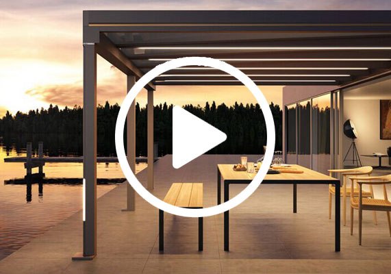 A modern terrace situation with a table and benches under a sleek overhang, surrounded by water and trees at sunset.