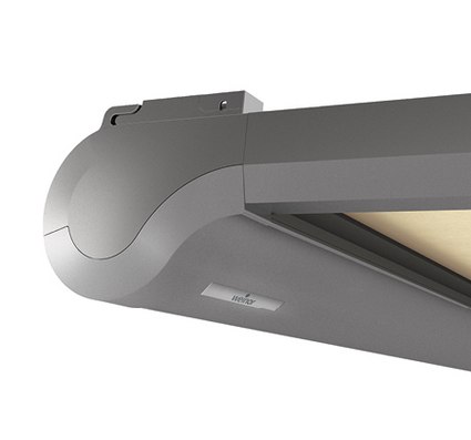 Close-up of a grey awning with a rounded design and a sleek modern look.