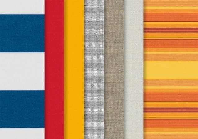 A collection of fabric swatches in various colours, including blue, red, yellow, grey, and orange stripes. A collection of fabric swatches in various colours, including blue, red, yellow, grey, and orange stripes.